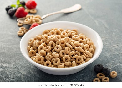 Healthy cold cereal in a white bowl, quick breakfast or snack for children