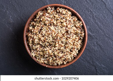 Healthy colorful cooked quinoa . Superfood background