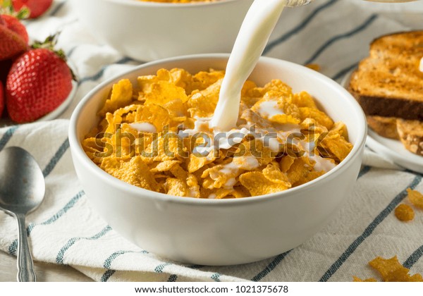 Healthy\
Corn Flakes with Milk for Breakfast with\
Fruit