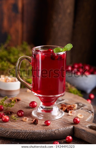 Healthy cranberry juice\
drink and fresh cranberries. Traditional Russian beverage mors.\
Cranberry tea.
