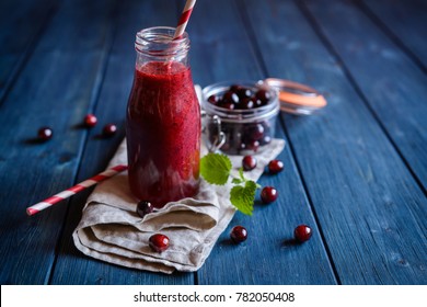 Healthy Cranberry Smoothie In A Glass Bottle