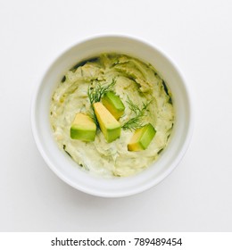 Healthy Creamy Avocado Dip On A White Background, Top View