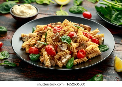 Healthy Creamy Hummus Pasta With Mushroom And Roast Tomatoes. Vegan Vegetarian, Plant Based.