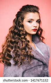 Healthy Curls That Look Bouncy. Hair Styling In Beauty Salon. Teenage Girl With Stylish Wavy Hairstyle. Pretty Girl With Curly Hairstyle. Young Woman With Long Locks Of Hair. Healthy Hair Care Habits.