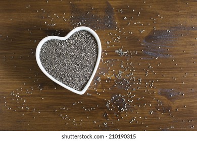 Healthy Dark Chia Seeds In Heart Container