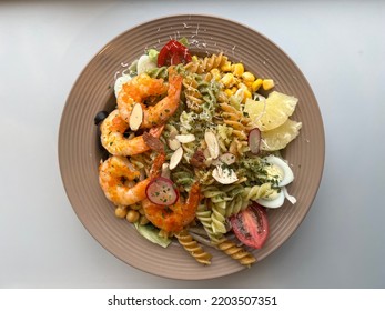 Healthy Delicious Food. Shrimp And Pasta Salad With Sliced Small Tomato, Pineapple, And Chickpeas. Vegetable Food.