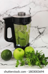 Healthy Detox Vegetables And Fruit Making Green Juice With Juice Machine In Home Kitchen-Healthy Concept