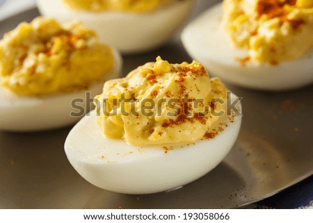 Healthy Deviled Eggs as an Appetizer with Paprika
