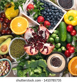 Healthy diet background. Clean and detox eating. Vegan or gluten free diet. Raw organic fruits, vegetables, grain and superfood  for  cooking  - Shutterstock ID 1410785735