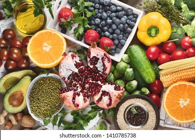 Healthy diet background. Clean and detox eating. Vegan or gluten free diet. Raw organic fruits, vegetables, grain and superfood  for  cooking  - Shutterstock ID 1410785738