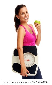 healthy diet eating woman with scale and apple for weightloss