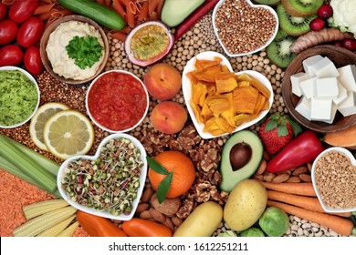 Healthy Diet Vegan Food With Grains, Nuts, Dips, Bean Curd, Fruit, Vegetables, Legumes & Spice. Food High In Antioxidants, Vitamins, Dietary Fibre, Smart Carbs & Protein. Plant Based Diet Concept. 