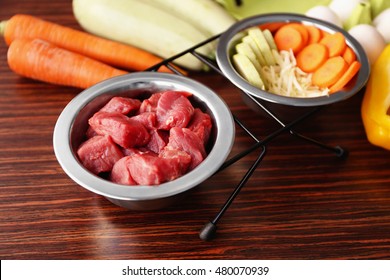 Healthy Dog Food On Wooden Background