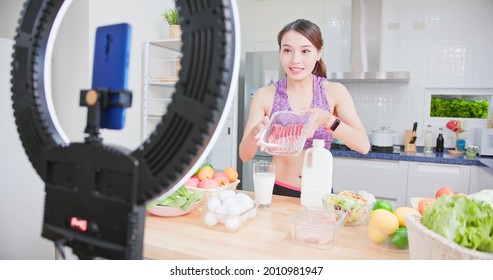 Healthy Eating Diet Concept - Asian Pretty Live Streamer Introduce High Protein Food With Meat And Milk Online By Smart Phone