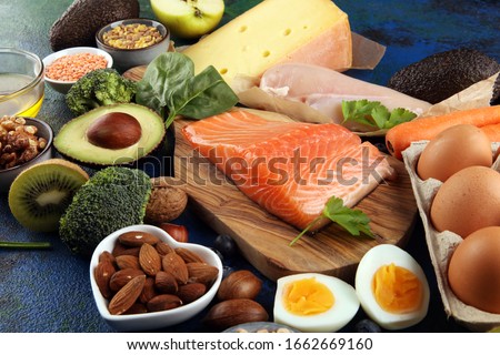 healthy eating and diet concept - natural rich in protein food on table