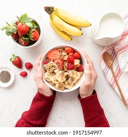 Healthy eating and dieting. Healthy breakfast, cereal, fresh berries and milk in a bowl with copy space, top view flat lay - Powered by Shutterstock