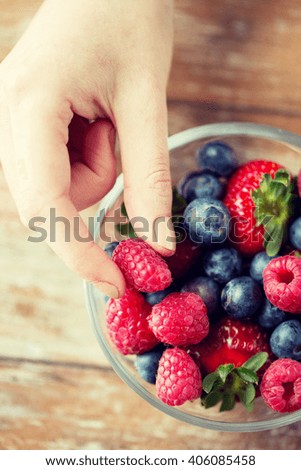 Similar – Foto Bild rote Beeren im Rampenlicht