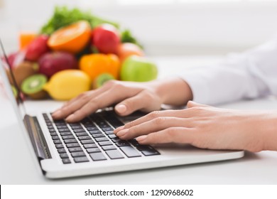 Healthy Eating And Food Coach Concept. Nutritionist Consultation Online, Dietitian Typing Treatment To Patient Via Internet, Copy Space