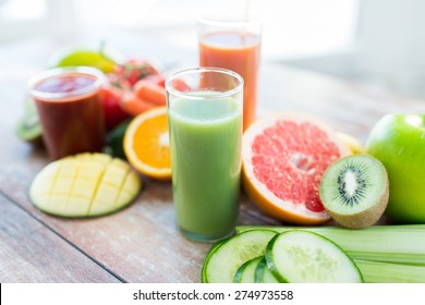 Healthy Eating, Food And Diet Concept- Close Up Of Fresh Juice Glass And Fruits On Table