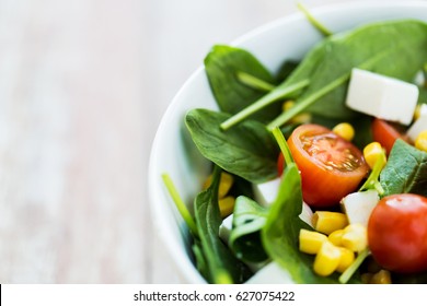 Healthy Eating, Food, Dieting And Vegetarian Concept - Close Up Of Vegetable Salad In Bowl