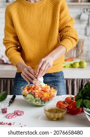 Healthy Eating. Front View Of Female Hands Making Salad Cutting Feta Cheese In The Kitchen