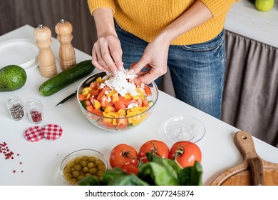 Healthy Eating. Front View Of Female Hands Making Salad Cutting Feta Cheese In The Kitchen