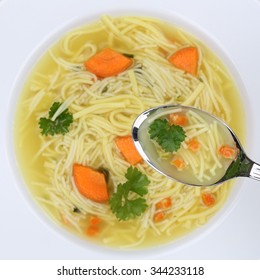 Healthy Eating Noodle Soup Meal In Bowl With Noodles From Above And Spoon