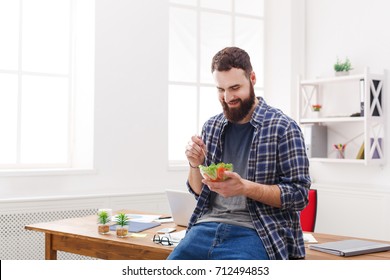 Healthy Eating In Office, Man Has Lunch With Fresh Salad, Copy Space