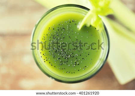 Similar – Foto Bild Grünkohl Smoothie im Glas auf weißem Holzgrund.