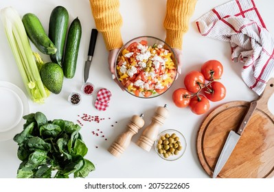 Healthy Eating. Top View Of Female Hands Making Greek Salad