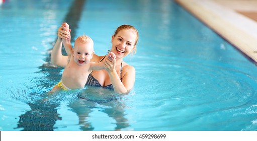 Healthy Family Mother Teaching Baby Swimming Pool