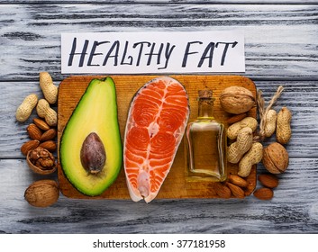 Healthy Fat Salmon, Avocado, Oil, Peanuts, Walnuts, Almond. Selective Focus