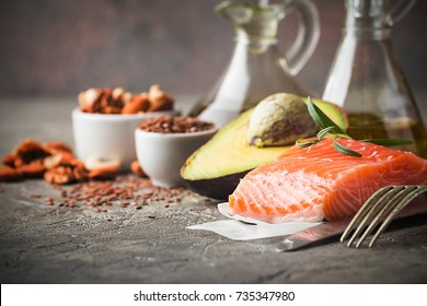 Healthy Fats In Nutrition - Salmon, Avocado, Oil, Nuts. Concept Of Healthy Food