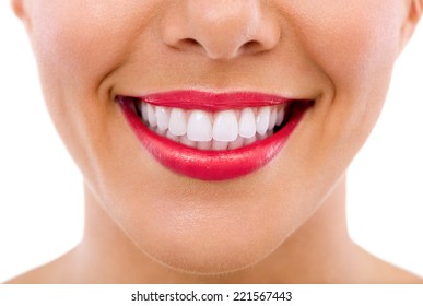 Healthy female teeth and smile, isolated over white background. - Shutterstock ID 221567443