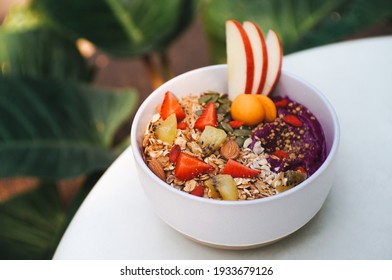 Healthy Food Acai Breakfast Superfoods Smoothie Bowl With Chia Seeds, Bee Pollen, Fresh Strawberry, Apple, Almond And Granola For Healthy Vegan