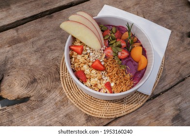 Healthy Food Acai Breakfast Superfoods Smoothie Bowl With Chia Seeds, Bee Pollen, Fresh Strawberry, Apple, Almond And Granola For Healthy Vegan 