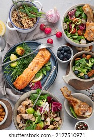 Healthy food assortment on light background. Dieting concept. Flat lay, top view, copy space