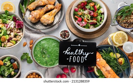Healthy food assortment on light background. Dieting concept. Flat lay, top view