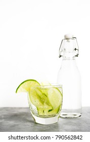 Healthy Food Background: Cucmber And Lime Detox Soda Water. Vegetarian Food Concept. Text Space