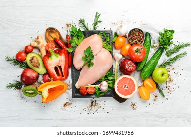 Healthy Food Background. Fresh Vegetables, Fruits And Chicken Meat. Free Space For Your Text. Rustic Style.