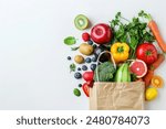 Healthy food background. Healthy food in paper bag vegetables and fruits on white. Food delivery, shopping food supermarket concept