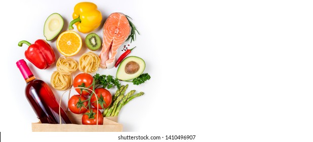 Healthy Food Background. Healthy Food In Paper Bag Fish, Pasta, Vegetables, Fruits And Wine On White Background. Shopping Food Supermarket Concept. Healthy Eating, Cooking Dinner Concept