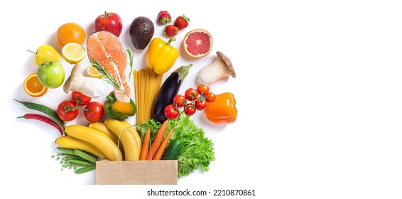 Healthy food background. Healthy food in paper bag fish, vegetables and fruits on white. Shopping food supermarket concept. Long format with copy space - Shutterstock ID 2210870861