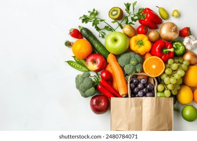 Healthy food background. Healthy food in paper bag vegetables and fruits on white. Food delivery, shopping food supermarket concept - Powered by Shutterstock