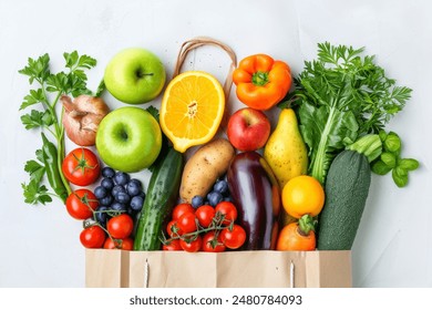 Healthy food background. Healthy food in paper bag vegetables and fruits on white. Food delivery, shopping food supermarket concept - Powered by Shutterstock