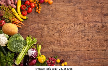 Healthy Food Background / Studio Photo Of Different Fruits And Vegetables On Old Wooden Table 