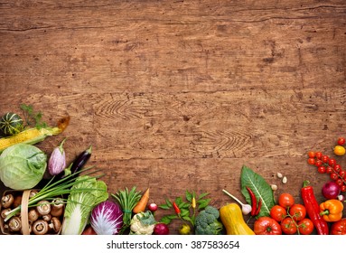 Healthy food background. Studio photo of different fruits and vegetables on old wooden table. High resolution product. - Powered by Shutterstock