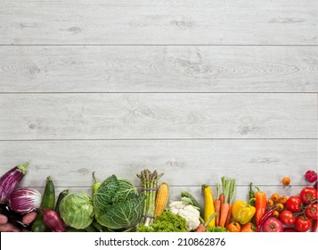 Healthy Food Background / Studio Photography Of Different Fruits And Vegetables On Wooden Table 