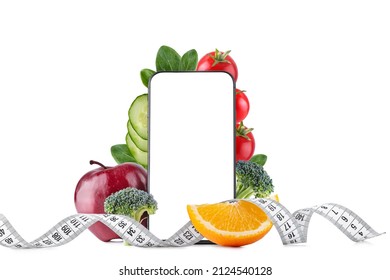 healthy food and beauty concept. Smartphone and fruits with vegetables and a measuring tape on a white isolated background