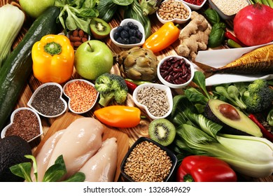 Healthy food clean eating selection. fruit, vegetable, seeds, superfood, cereals, leaf vegetable and fish and chicken. - Shutterstock ID 1326849629
